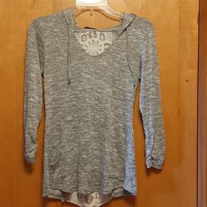 Grey long sleeve with lace back and hood.
